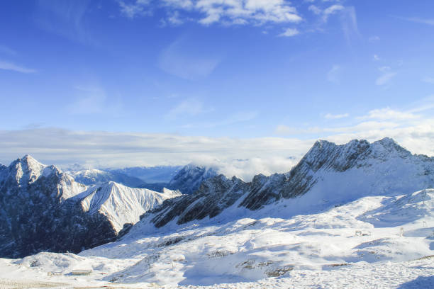 istock View of a mountain range with snow and clouds 845824606