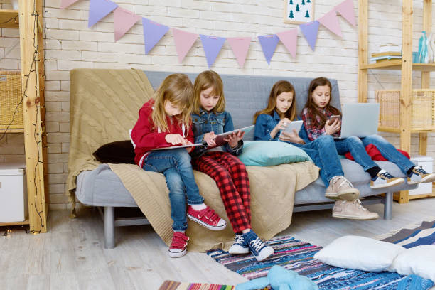 istock Kids addicted to gadgets 845825432