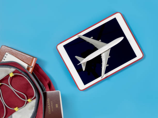 istock Plane flying on a tablet for Backpacker traveler travel concept 845835902