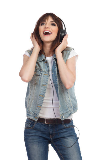 istock Singing Young Woman In Headphones 845836466