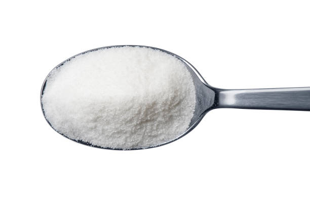 istock Spoon of sugar isolated on white background 845836598