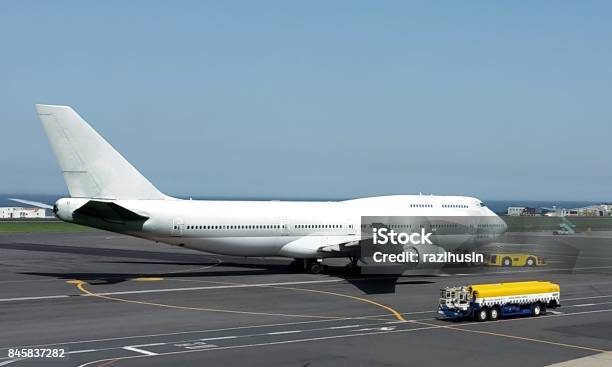 Airplane On Airport Ground Stock Photo - Download Image Now - Air Vehicle, Aircraft Wing, Airplane