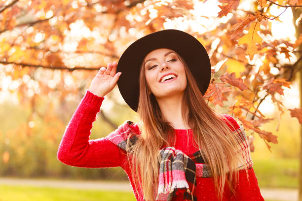 istock Woman walking in park during autumn 845839508