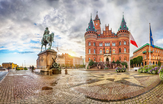 View on Helsingborg Town Hall from Stortorget square in rainy evening in Helsingborg, Sweden