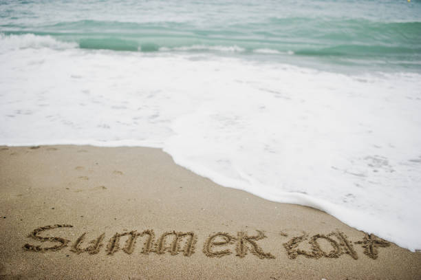 istock Summer 2017 end. New Year 2018 is coming concept. Sea and sand. 845844504