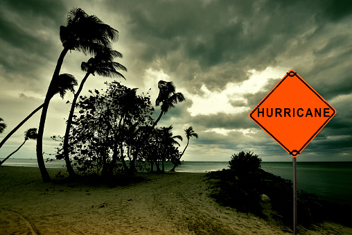 Hurricane road sign on a beach, Key West, Florida, USA.