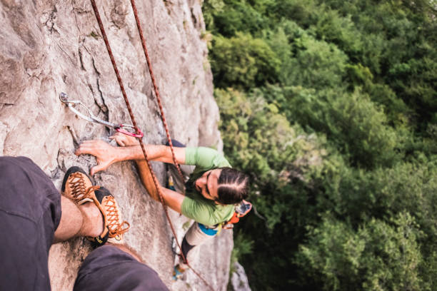 istock Mountaineer exercises to climb a cliff 845847754