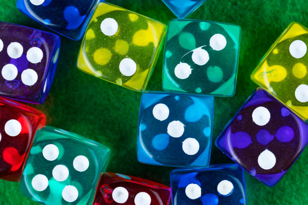 istock Colorful dice on a green casino background. 845848002