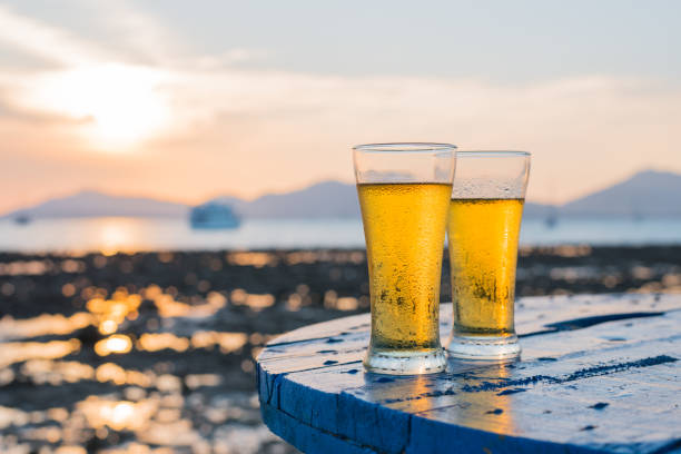 istock Glass of beer on a sunset 845848846