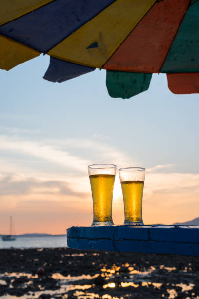 istock Glass of beer on a sunset 845848854