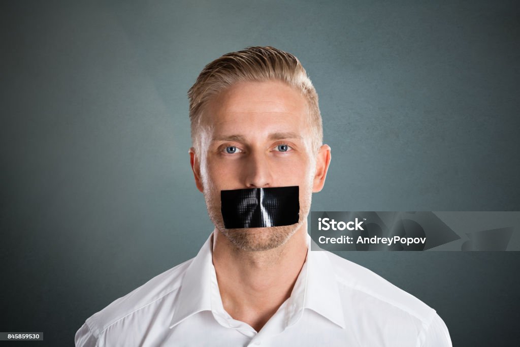 Man With Black Duct Tape Over His Mouth Stock Photo - Download