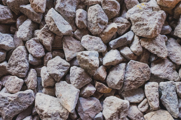 istock Abstract texture background with stones. Surface with a large number of stones. 845860148