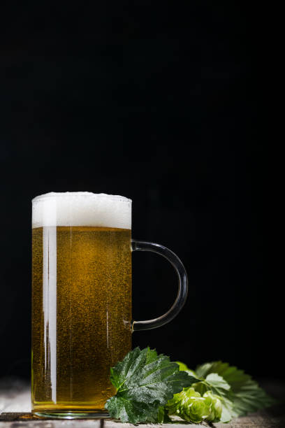 istock Glass of beer on table 845864556