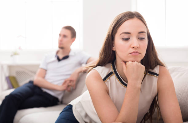 istock Young couple quarreling at home 845864880