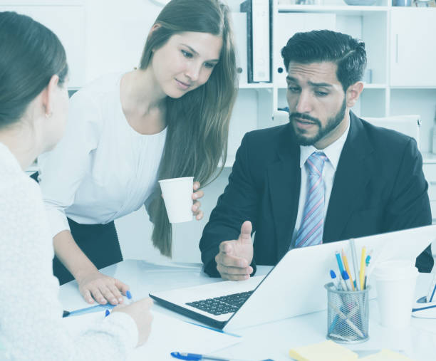 istock Business partners discussing in office 845872874