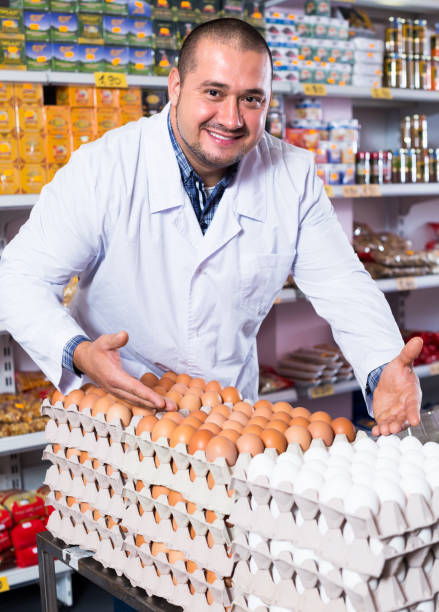 istock Man selling eggs in marketplace 845873156