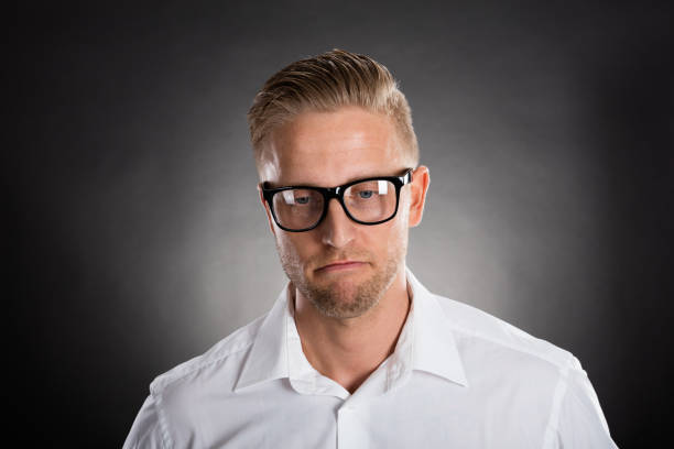 Hipster styled portrait a young man, studioshot with tilt shift lens