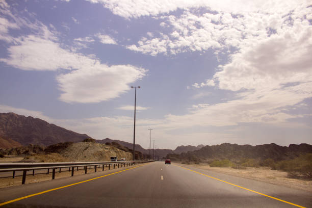 istock Car road in rock desert in Oman 845873644