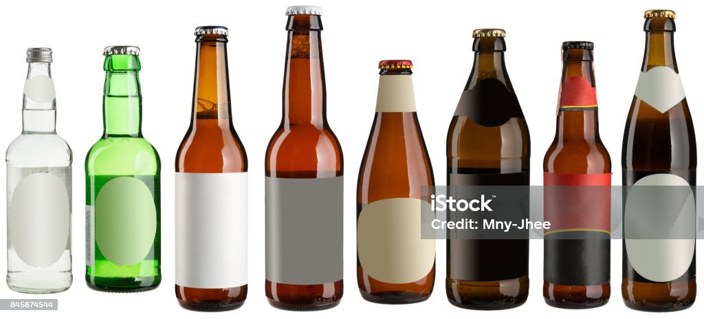 Set of multiple beer bottles with blank stickers isolated on white Set of multiple beer bottles with blank stickers isolated on white, high resolution Beer Bottle Stock Photo