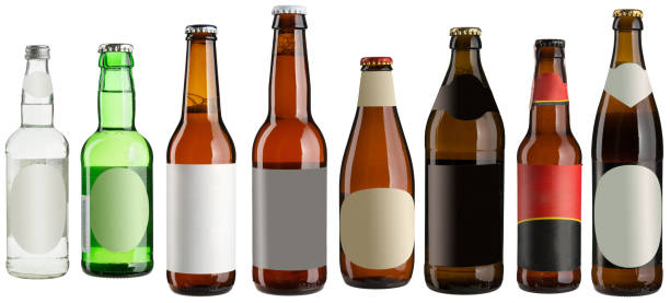Set of multiple beer bottles with blank stickers isolated on white stock photo