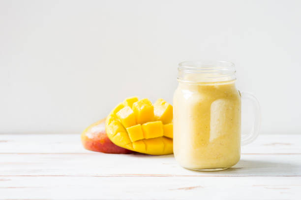 istock Mango, Banana, Pineapple and Oatmeal Smoothie in the Jar 845874620