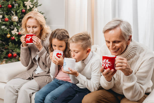 istock happy family celebrating christmas 845876906