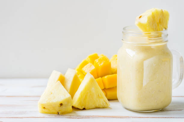istock Mango, Banana, Pineapple and Oatmeal Smoothie in the Jar 845876976