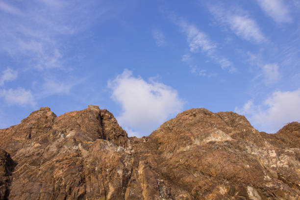 istock Yellow rock mountain in desert in Oman 845877222