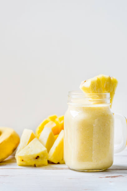 istock Mango, Banana, Pineapple and Oatmeal Smoothie in the Jar 845877232