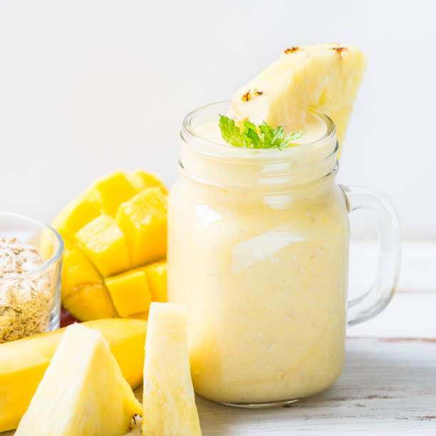 istock Mango, Banana, Pineapple and Oatmeal Smoothie in the Jar 845877346