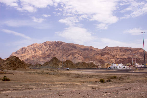 istock Yellow rock mountain in desert in Oman 845877842