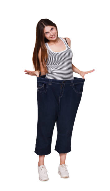 istock Woman wearing jeans much bigger size isolated on white background. 845884868