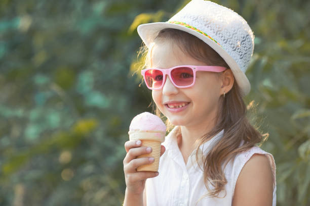 istock girl eating ice cream 845889406