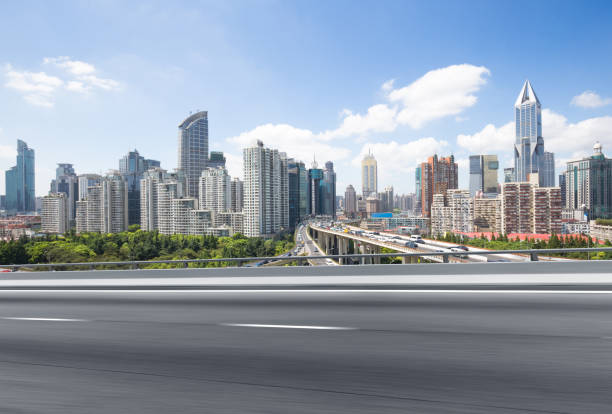 istock empty road with cityscape of modern city 845892272