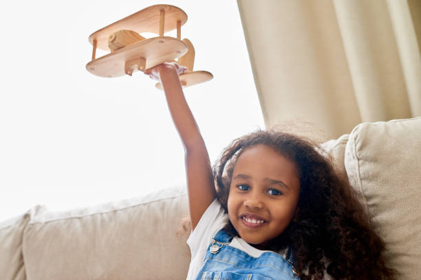 istock Excited girl dreaming to become pilot 845896512