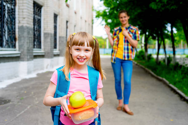 istock Mother and daughter at school 845900546