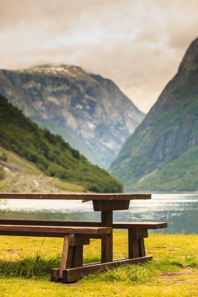 istock Camp site with picnic table in norwegian nature 845901092