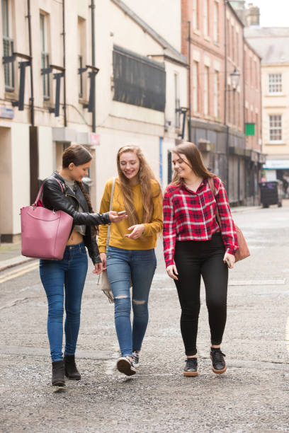 istock Teenage Girls Using Mobile Phone 845903570