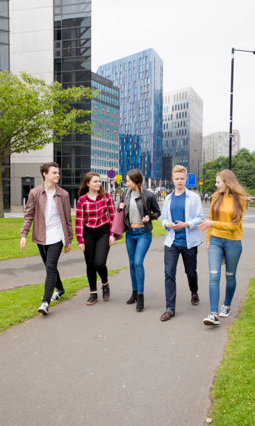 istock Teenagers Walk Down The Street 845903702