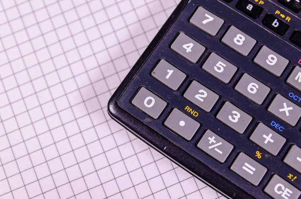 istock Calculator on blank sheet of paper. Top view 845910070