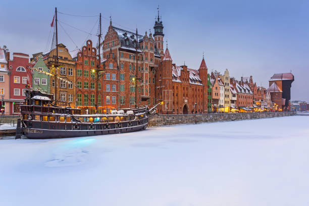 Old town of Gdansk at Motlawa river in snowy winter Old town of Gdansk at Motlawa river in snowy winter, Poland gdansk stock pictures, royalty-free photos & images
