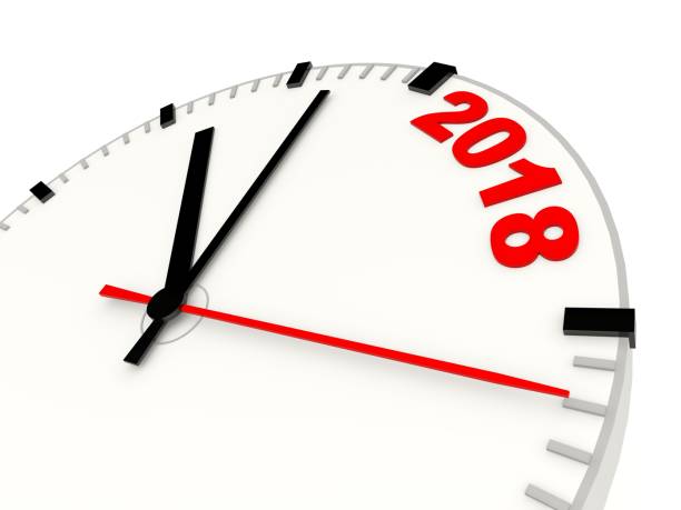 istock Clock with 2018 New Year sign isolated on white 845911290