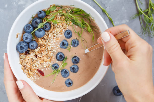 istock smoothie bowl with granola and berries. 845911426