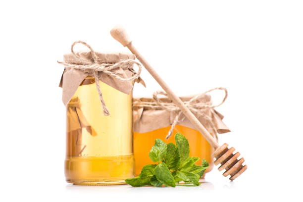 istock fresh honey in glass jars 845914218