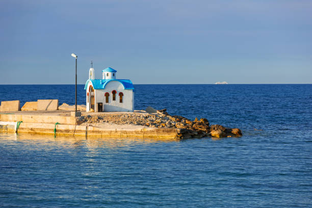 istock Beautiful chapel on the coast of Crete 845918338