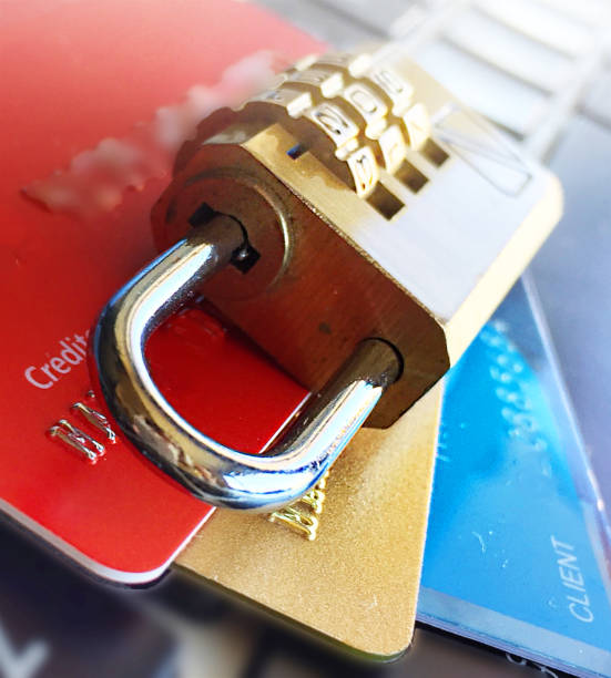 istock Credit cards and lock on computer keyboard. 845918670