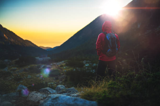 istock Traveler meets sunrise in mountain 845922766