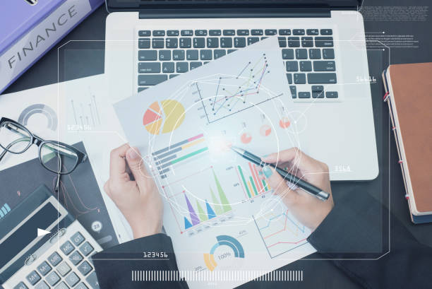 istock business accountant with document graph financial and calculator on office table. concept planning budget and audit. 845925646