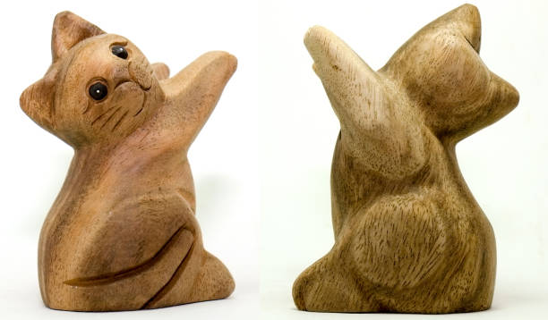 Isolated Lovely Brown Cat Wood Carving Model on White Background
