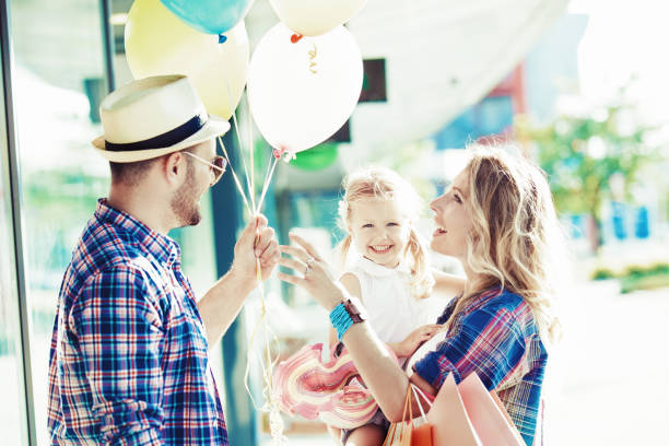 istock Happy Family in Shopping 845930238
